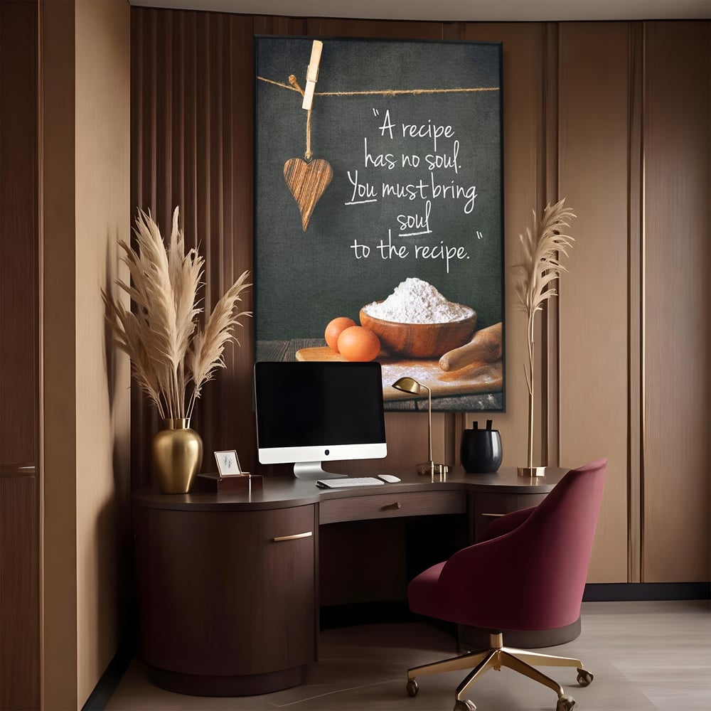 Tablou canvas cu tablou canvas cu citat culinar si faina, in rama de aluminiu negru, pe perete intr-un birou